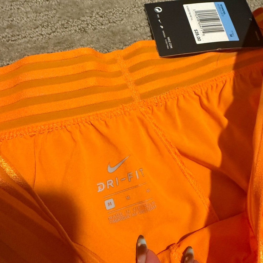 Nike Women's Bright Orange Athletic Shorts with White Logos - Picture 3 of 3